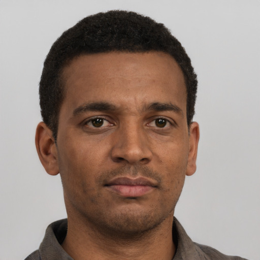 Neutral latino young-adult male with short  brown hair and brown eyes