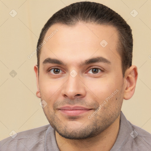 Joyful white young-adult male with short  brown hair and brown eyes