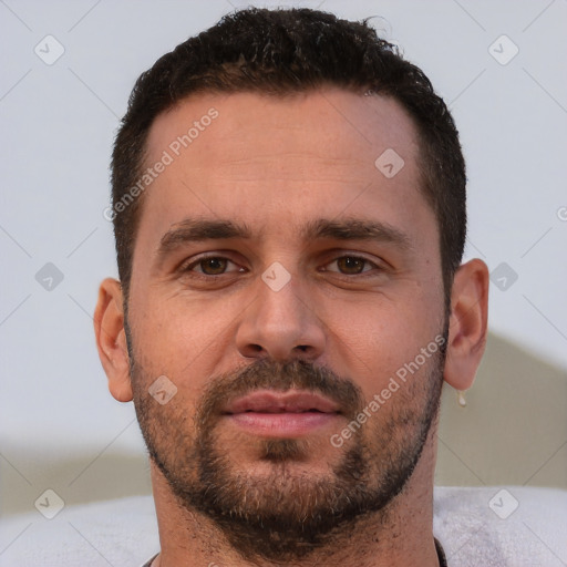 Neutral white young-adult male with short  brown hair and brown eyes