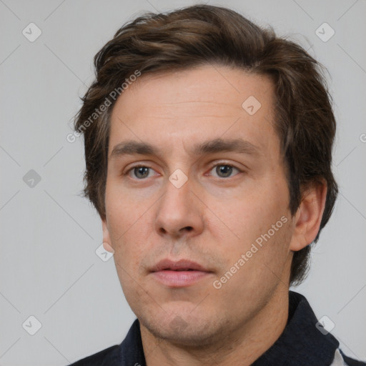 Neutral white adult male with short  brown hair and brown eyes