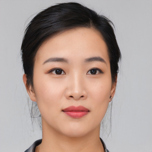 Neutral asian young-adult female with medium  black hair and brown eyes