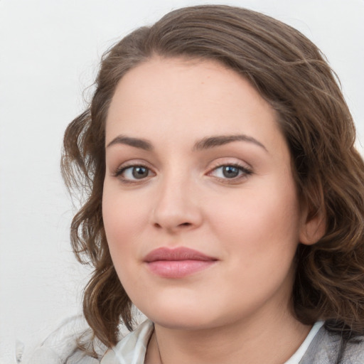 Neutral white young-adult female with medium  brown hair and grey eyes