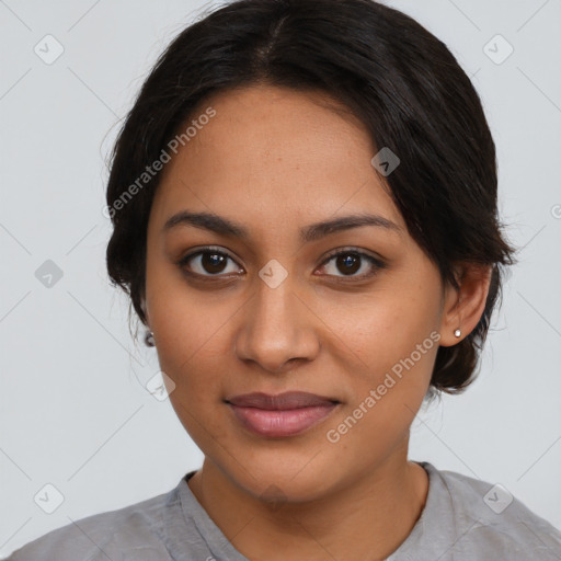 Joyful latino young-adult female with medium  brown hair and brown eyes