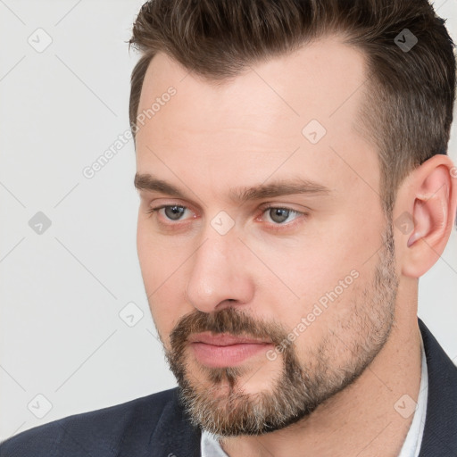 Neutral white young-adult male with short  brown hair and brown eyes