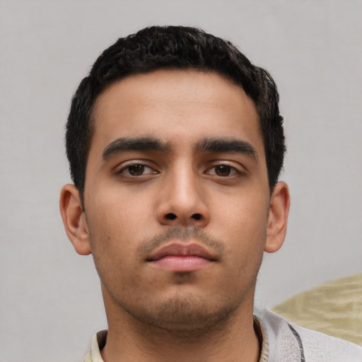 Neutral latino young-adult male with short  black hair and brown eyes