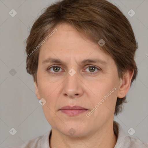 Joyful white adult female with medium  brown hair and grey eyes