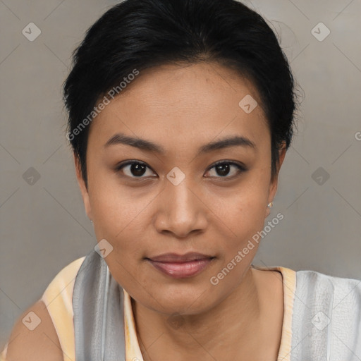 Joyful asian young-adult female with short  black hair and brown eyes