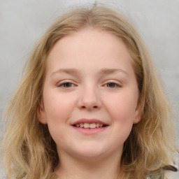 Joyful white child female with medium  brown hair and grey eyes