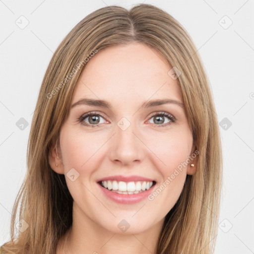 Joyful white young-adult female with long  brown hair and green eyes