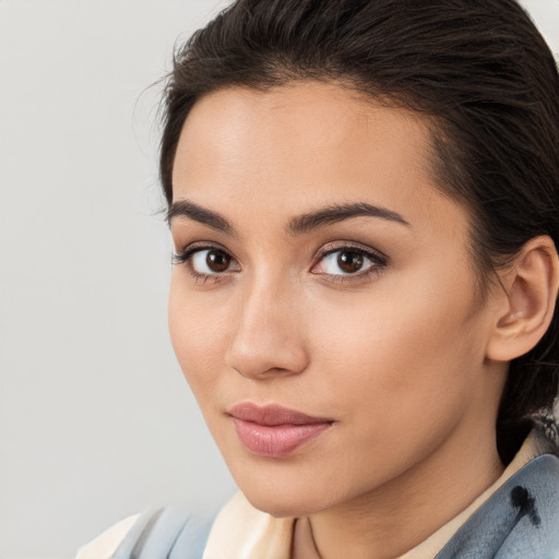 Neutral white young-adult female with medium  brown hair and brown eyes