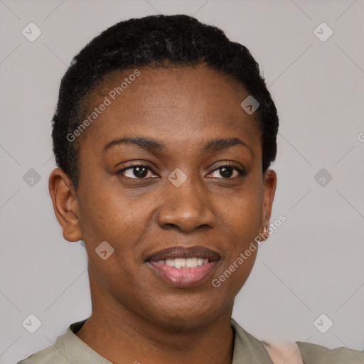 Joyful black young-adult female with short  black hair and brown eyes