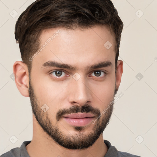 Neutral white young-adult male with short  brown hair and brown eyes