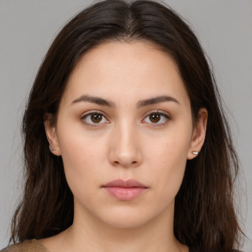 Neutral white young-adult female with medium  brown hair and brown eyes