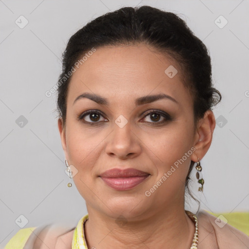 Joyful latino young-adult female with short  brown hair and brown eyes