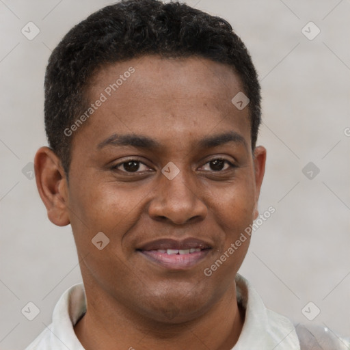 Joyful latino young-adult male with short  brown hair and brown eyes