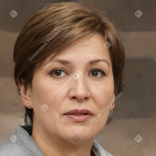 Joyful white adult female with medium  brown hair and brown eyes