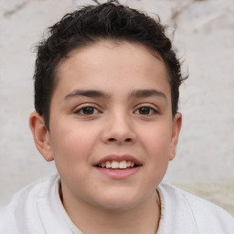 Joyful white child male with short  brown hair and brown eyes