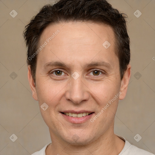 Joyful white adult male with short  brown hair and brown eyes