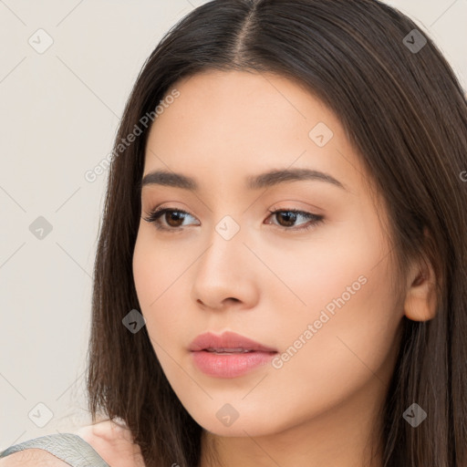 Neutral white young-adult female with long  brown hair and brown eyes