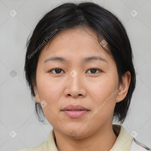 Neutral asian young-adult female with medium  brown hair and brown eyes