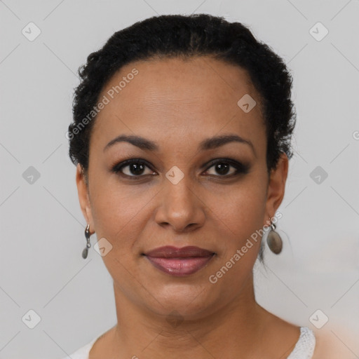 Joyful latino young-adult female with short  black hair and brown eyes