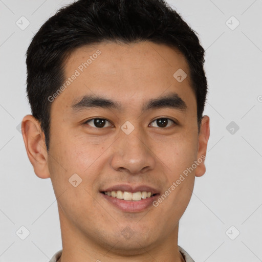 Joyful latino young-adult male with short  brown hair and brown eyes