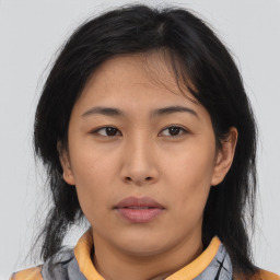 Neutral asian young-adult female with medium  brown hair and brown eyes