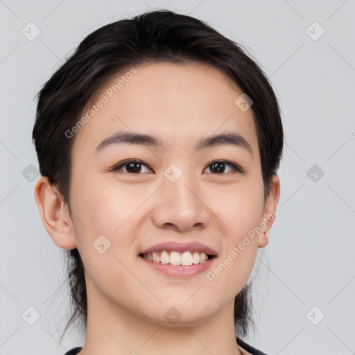 Joyful white young-adult female with short  brown hair and brown eyes