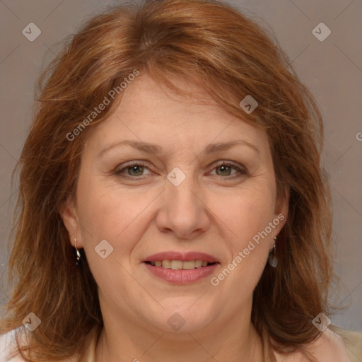 Joyful white adult female with medium  brown hair and brown eyes