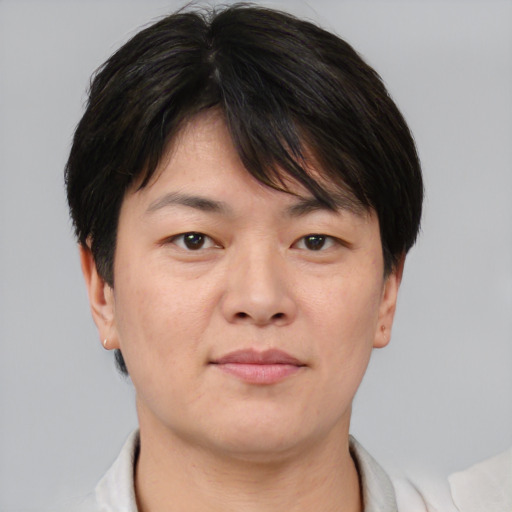 Neutral asian young-adult male with short  brown hair and brown eyes
