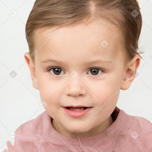 Joyful white child female with short  brown hair and brown eyes