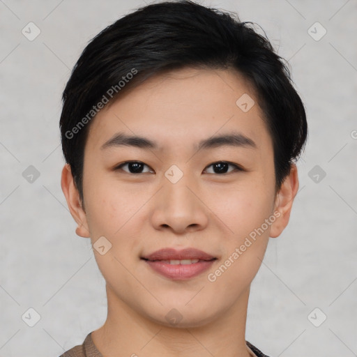 Joyful asian young-adult male with short  black hair and brown eyes