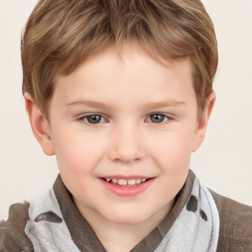 Joyful white child male with short  brown hair and brown eyes