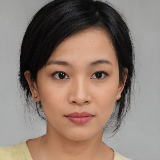 Neutral asian young-adult female with medium  black hair and brown eyes