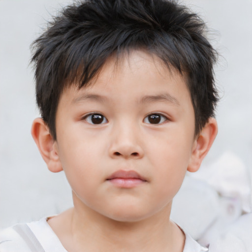 Neutral asian child male with short  brown hair and brown eyes