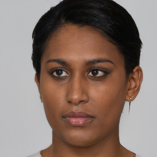 Neutral asian young-adult female with short  brown hair and brown eyes