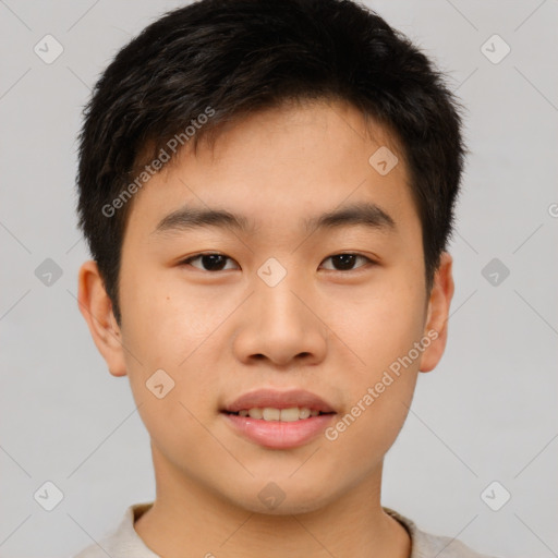 Joyful asian young-adult male with short  brown hair and brown eyes