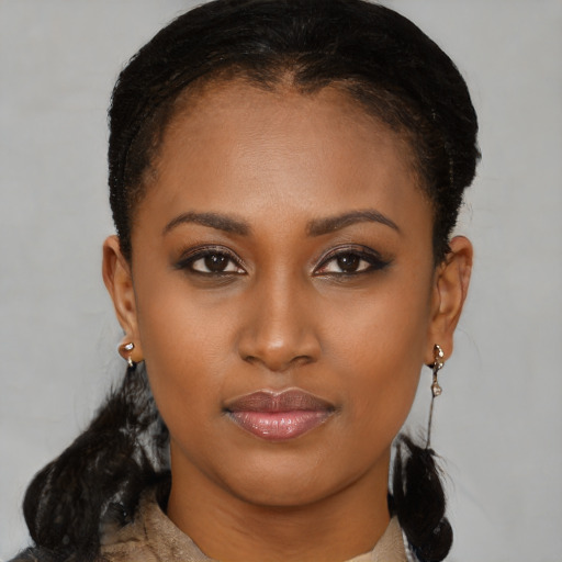 Neutral black young-adult female with medium  brown hair and brown eyes