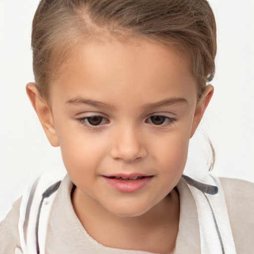 Joyful white child female with short  brown hair and brown eyes