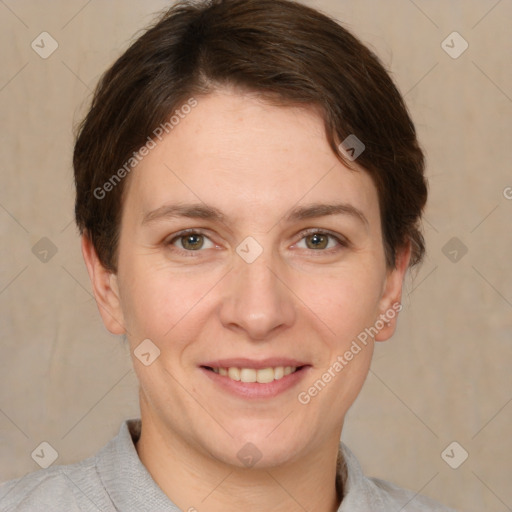 Joyful white adult female with short  brown hair and brown eyes