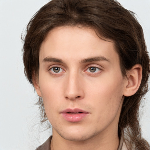 Neutral white young-adult male with medium  brown hair and brown eyes