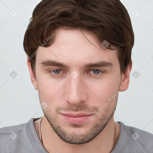 Neutral white young-adult male with short  brown hair and grey eyes