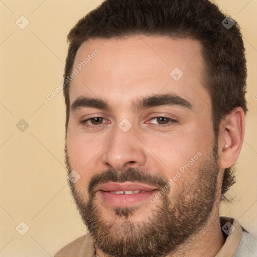 Joyful white young-adult male with short  brown hair and brown eyes