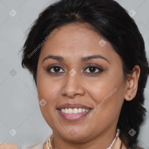 Joyful latino young-adult female with medium  brown hair and brown eyes