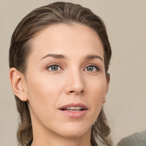 Neutral white young-adult female with medium  brown hair and brown eyes