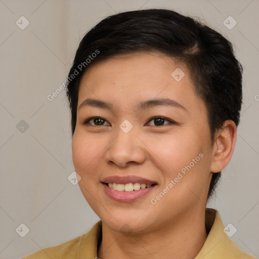 Joyful asian young-adult female with short  brown hair and brown eyes