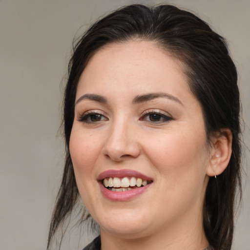 Joyful white young-adult female with medium  brown hair and brown eyes