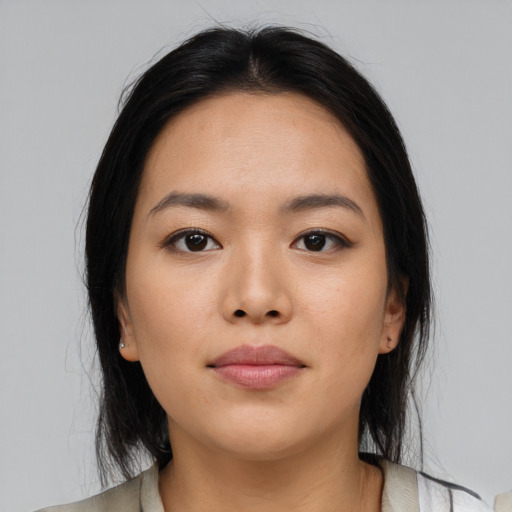 Neutral asian young-adult female with medium  brown hair and brown eyes