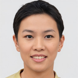 Joyful asian young-adult female with short  brown hair and brown eyes