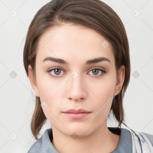 Neutral white young-adult female with medium  brown hair and grey eyes